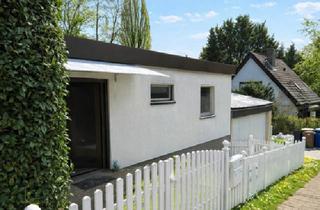 Haus kaufen in 65510 Hünstetten, Hünstetten - Provisionsfreier Bungalow mit großem Gartenpotenzial & Doppelgarage