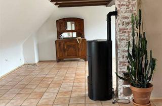 Wohnung kaufen in 76532 Baden-Baden, Baden-Baden - Hoch über den Dächern - Charmante Dachgeschosswohnung mit Komfort und Weitblick im Grünen