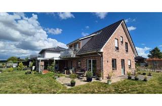 Einfamilienhaus kaufen in Buxtehuder Straße 34, 28870 Ottersberg, Ottersberg - Neuwertiges Einfamilienhaus (KfW 55) inkl. Einliegerwohnung mit traumhaftem Blick über die Wiesen