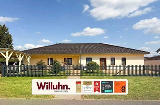 Haus kaufen in 04509 Löbnitz, Löbnitz - Außergewöhnliches ebenerdiges Zweifamilienhaus auf wunderschönem Grundstück mit Pool und Erdwärme