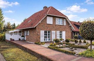 Einfamilienhaus kaufen in 49843 Uelsen, Uelsen - #RESERVIERT# Einziehen und wohlfühlen - Einfamilienhaus mit Kamin, Büro und Terrasse