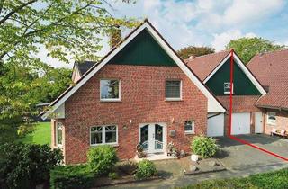 Doppelhaushälfte kaufen in 49828 Neuenhaus, Neuenhaus - Große Doppelhaushälfte mit Garage in zentraler Lage von Neuenhaus.