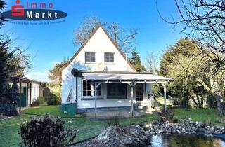 Einfamilienhaus kaufen in 32469 Petershagen, Petershagen - Harmonisches Einfamilienhaus mit idyllischem Garten in bester Lage!