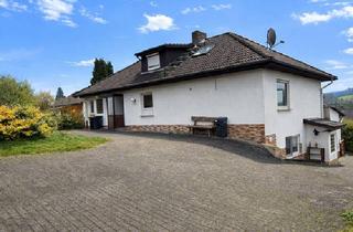 Einfamilienhaus kaufen in 36287 Breitenbach, Breitenbach am Herzberg - Familienfreundliches Einfamilienhaus mit vermieteter Einliegerwohnung in Oberjossa