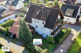 Wohnung kaufen in 64747 Breuberg, Breuberg - Rarität: Zwei Wohnungen - ein Preis. Wohnen, wo andere Urlaub machen, mit Garten & Carport