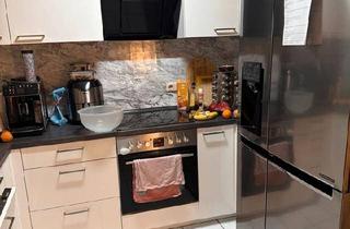 Wohnung kaufen in 63584 Gründau, Gründau - Gepflegte 3,5 Zimmer-Wohnung mit Balkon und Einbauküche in Gründa