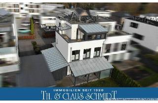 Haus kaufen in 26180 Rastede, Rastede - Einzigartige Kombination: Maisonette-Penthouse mit zusätzlicher Erdgeschosswohnung in Toplage