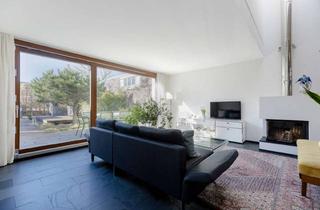 Einfamilienhaus kaufen in 60488 Praunheim, Licht, Linien, Lebensqualität – Stilvolles Einfamilienhaus mit ästhetisch angelegter Außenfläche