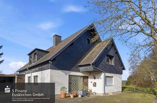 Haus kaufen in 53902 Bad Münstereifel, Bad Münstereifel-Langscheid: großzügiges Zweifamilienhaus mit Doppelgarage, Garten und optionalem