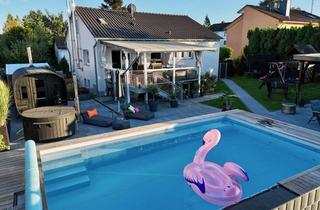 Einfamilienhaus kaufen in 65329 Hohenstein, Hohenstein-Holzhausen: Ein Wellness-Einfamilienhaus der Premiumklasse in direkter Wiesenrandlage!