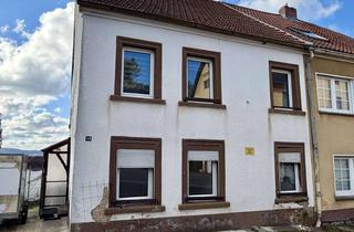 Einfamilienhaus kaufen in 66399 Mandelbachtal, Gelegenheit für Handwerker: Stark renovierungsbedürftiges Einfamilienhaus