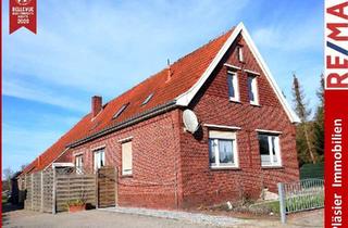 Haus kaufen in 26817 Rhauderfehn, 3-Parteien-Fehnhaus * Rajen/Rhauderfehn * vermietet * Kanallage * 1681 m² Grundstück *