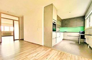 Wohnung kaufen in 72108 Rottenburg, Modernisierte 3,5-Zimmer-Wohnung mit Balkon, Ausblick & Garage in Rottenburg