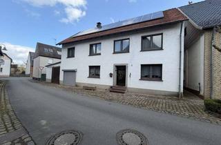 Einfamilienhaus kaufen in 33034 Brakel, Solides Einfamilienhaus mit Garten, Garage und PV-Anlage in Erkeln