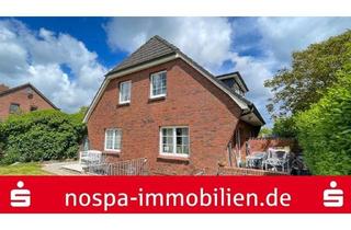 Haus kaufen in 25938 Midlum, Ihr Traum am Ortsrand von Oevenum! Solide Immobilie auf großem Grundstück