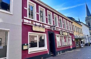 Haus kaufen in 47877 Willich, Willich - Wohn- und Geschäftshaus mit freier Wohnung