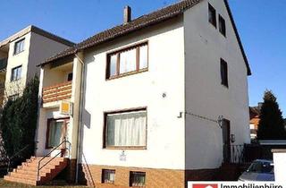 Haus kaufen in 31832 Springe, Springe - Zweifamilienhaus mit zwei rechtlich getrennten Einheiten bzw. Ladenlokal mit einer Wohnung in Bennigsen