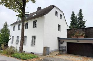Haus kaufen in 42781 Haan, Haan - Renovierungsbedürftiges 2-Familienhaus mit Garage und parkähnlichen Grundstück