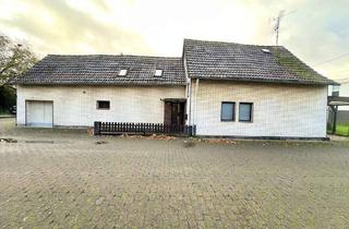 Einfamilienhaus kaufen in 40764 Langenfeld, Langenfeld / Berghausen - Sanierungsbedürftiges Haus mit großem Garten und Garage in idyllischer Feldrandlage