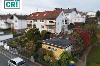 Haus kaufen in 35075 Gladenbach, Gladenbach / Mornshausen - Großzügiges Zweifamilienhaus mit vielseitigen Nutzungsmöglichkeiten in Gladenbach-Mornshausen