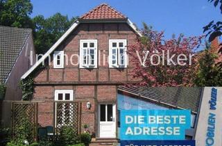Haus kaufen in 49439 Steinfeld, Steinfeld - Idyllisches Zweifamilienhaus in zentraler Lage - denkmalgeschützt und vermietet!
