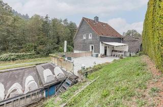 Mehrfamilienhaus kaufen in 42399 Wuppertal, Wuppertal - Vermietung und Selbstnutzung: Mehrfamilienhaus mit 7 Einheiten, Kfz-Stellplätzen und Garagen