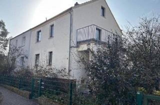 Doppelhaushälfte kaufen in 35415 Pohlheim, Pohlheim - Renovierungsbedürftige Doppelhaushälfte in Pohlheim