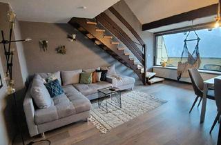 Wohnung kaufen in 38685 Langelsheim, Langelsheim - Stilvolle 3-Zimmer Dachgeschosswohnung mit Balkon, Kamin , Garage