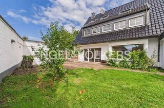 Wohnung kaufen in 47803 Krefeld, Krefeld - Helle Gartenwohnung mit Kamin, Doppelgarage nahe dem Krefelder Stadtwald