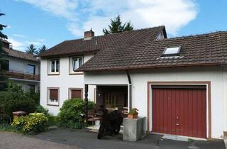 Mehrfamilienhaus kaufen in 63619 Bad Orb, Bad Orb - AUMÜLLER-Immobilien - Freundliches Dreifamilienhaus mit Garage in direkter Nähe zum Kurpark