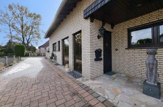 Doppelhaushälfte kaufen in 33161 Hövelhof, Hövelhof - Charmante Doppelhaushälfte mit Wintergarten, Kamin und sonnigem Garten in Hövelhof