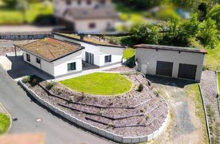 Einfamilienhaus kaufen in 36148 Kalbach, Kalbach - NEUER PREIS! Moderner Niedrigenergie-Bungalow (KfW 55) mit großer 3-fach-Garage in ruhiger Lage