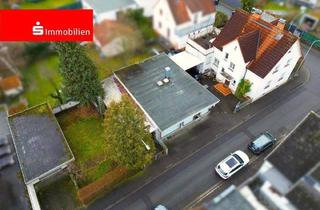 Haus kaufen in 63179 Obertshausen, Obertshausen - Wohnen und Arbeiten auf einem Grundstück! 2-FH mit Ladeneinheit und Garage