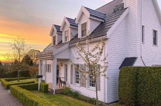 Einfamilienhaus kaufen in 61273 Wehrheim, Wehrheim - Wohnen wie im Urlaub - Holzhaus in Premiumlage mit Einbauküche, Garten und Carport