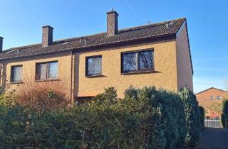 Haus kaufen in 59229 Ahlen, Ahlen - Ahlener Innenstadt, ein Reihenendhaus mit kleinem Garten, Vollkeller und Garage.