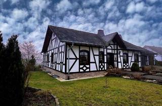 Einfamilienhaus kaufen in 56858 Peterswald-Löffelscheid, Peterswald-Löffelscheid - Gepflegtes und weitläufiges Einfamilienwohnhaus mit Doppelgarage und Bauplatz