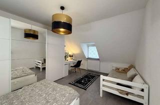 Wohnung kaufen in 65428 Rüsselsheim, Modernisierte 2-Zimmer-Dachgeschosswohnung mit Bad und Gäste-WC in Rüsselsheim