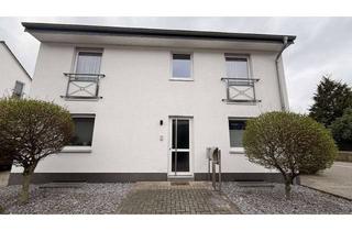 Wohnung kaufen in 47445 Moers, Attraktive 4-Zimmer-Wohnung mit Balkon, Garten und Garage in ruhiger Lage