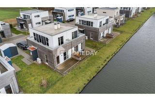 Haus kaufen in 26969 Butjadingen, Zweitwohnsitz zum Wohlfühlen: exklusives Ferienhaus mit Terrasse, Balkon und Garten