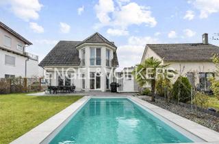 Einfamilienhaus kaufen in 65428 Rüsselsheim, Modernes Einfamilienhaus mit Pool in familienfreundlicher Lage