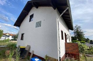 Haus kaufen in 35410 Hungen, Sanierungsobjekt mit Garage und Terrasse in Hungen-Inheiden