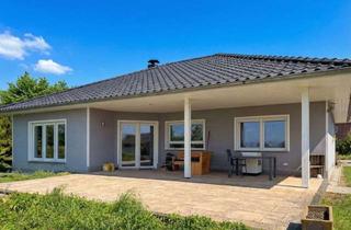 Haus kaufen in 06901 Dabrun, Wohnen auf einer Ebene – moderner Bungalow mit Traumgrundstück in Dabrun