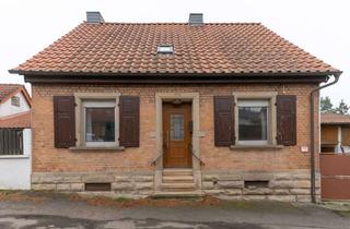 Einfamilienhaus kaufen in 67304 Kerzenheim, Sanierungsbedürftiges Einfamilienhaus mit Garten, zwei Garagen und Nebengebäuden in Kerzenheim