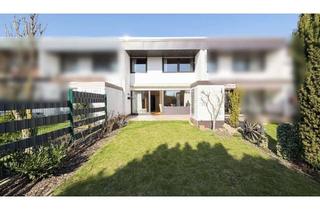 Reihenhaus kaufen in 60437 Nieder-Eschbach, Reihenhaus mit Garten und Garage in Feldrandlage