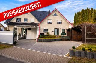 Reihenhaus kaufen in 32351 Stemwede, verklinkertes Reihenhaus mit zwei Wohnebenen, Garten und Carport in Stemwede / Wehdem