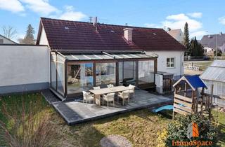 Haus kaufen in 86497 Horgau, **IMMOSPACE - Bungalow mit XXL-Wintergarten, lichtdurchflutetem Wohnkonzept und idyllischem Garten**