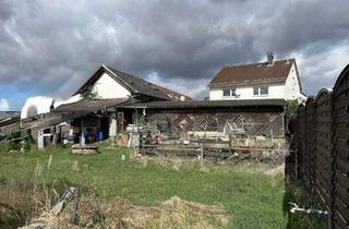 Mehrfamilienhaus kaufen in 64331 Weiterstadt, Zwei Häuser mit sehr großem Garten / Bauplatz