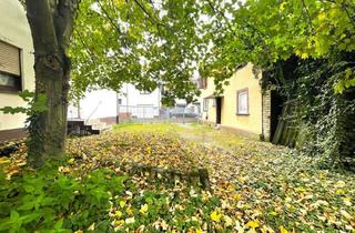 Grundstück zu kaufen in 60437 Nieder-Eschbach, Attraktives Baugrundstück in Altstadtlage mit Altbestand