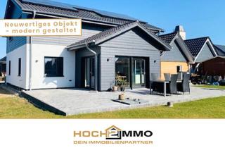 Einfamilienhaus kaufen in 23714 Nüchel, Großzügiges Architektenhaus mit Carport, Wärmepumpe und PV-Anlage in ruhiger Lange!