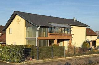 Haus kaufen in 55599 Gau-Bickelheim, Gau-Bickelheim - Großzügiges Zweifamilienhaus mit Garten und Doppelgarage in Feldrandlage